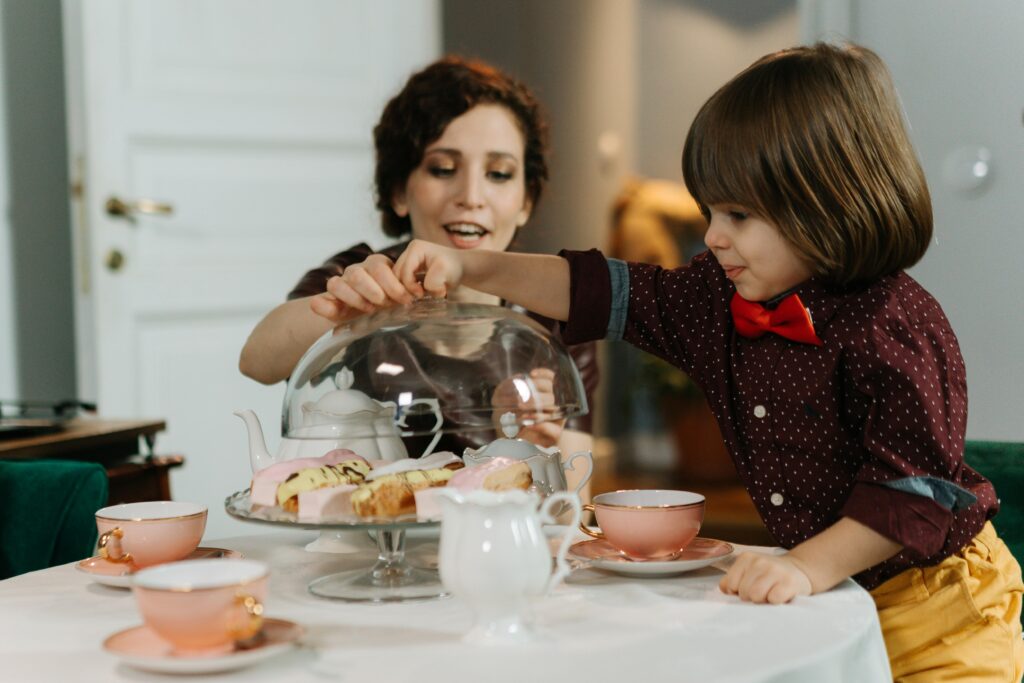 Professional nanny caring for a child in a modern family home representing childcare selection for families